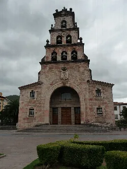 Santa María church with tower and bells in Cangas de Onís.