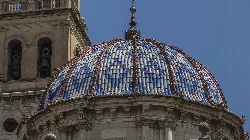 Colorful tiled dome of the Church of the Assumption in Carcaixent.