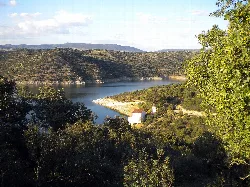 Views of the Tajo river, hills, and a hermitage in Talaván.