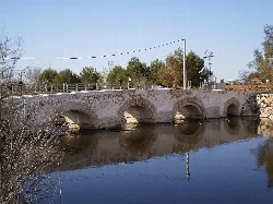 Stone bridge with five arches over the Záncara river in Pedro Muñoz.