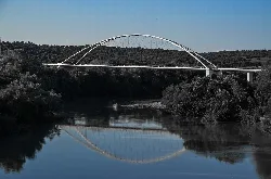 White arch bridge over the Guadalquivir river
