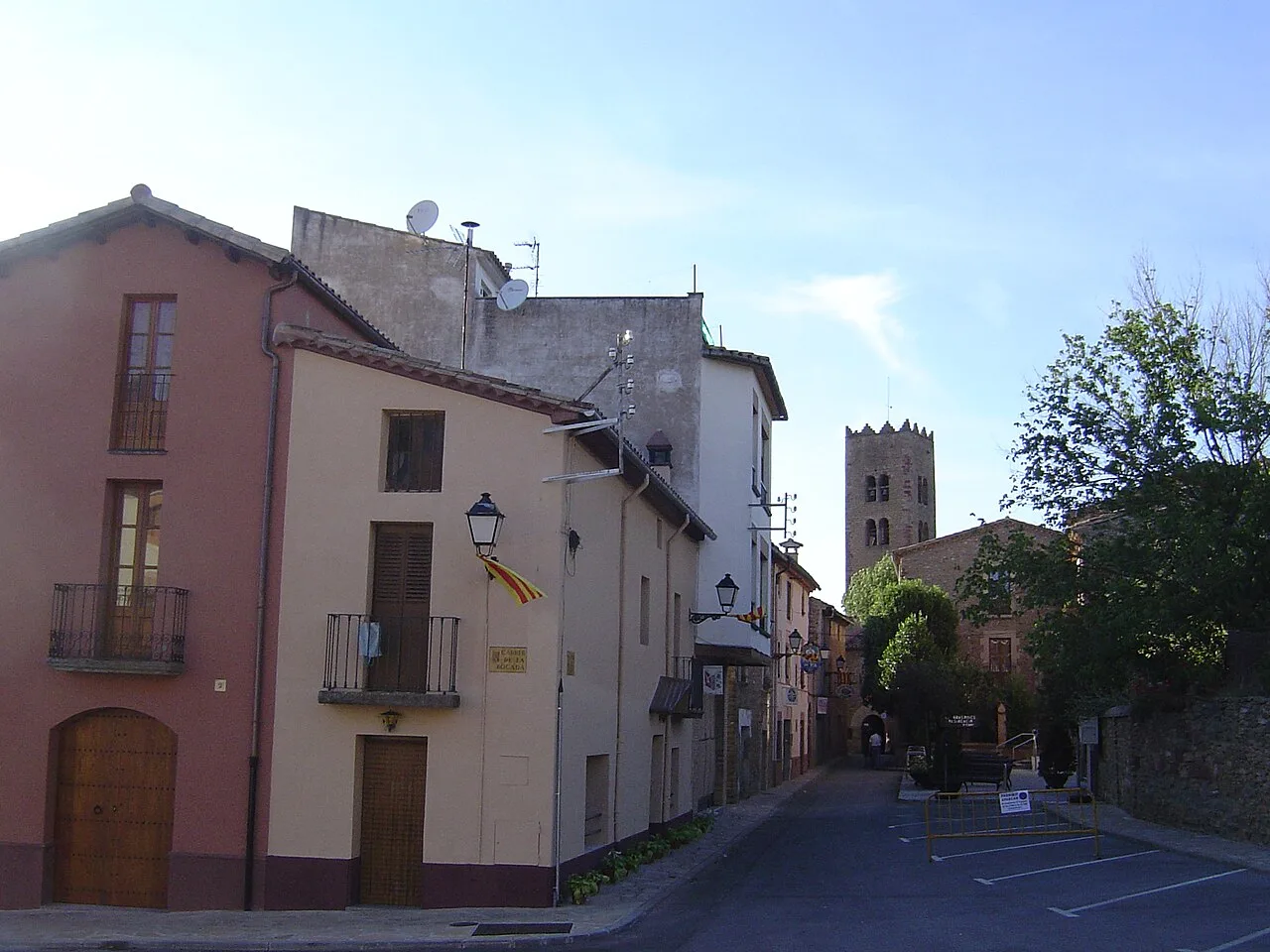 Image of the entry on the ancient nucleus of Seva, in the background the church of Santa Maria of Seva.