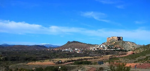 Mesones de Isuela town. View of the Moncayo Massif in the background