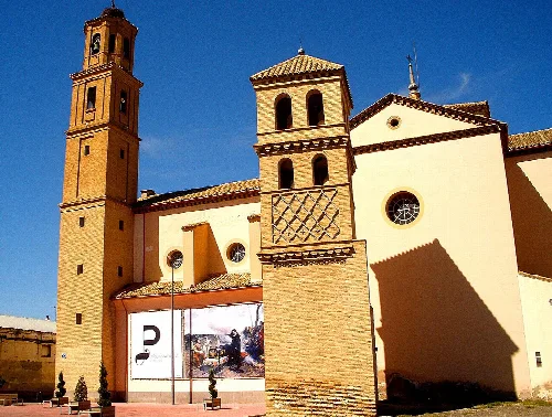 Church of the Savior with tower and façade in Villanueva de Gállego.
