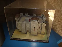 Model of a castle in a display case.