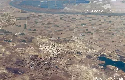 Vista aérea de Lebrija con campos y río Guadalquivir.