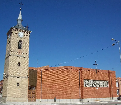Church of John the Baptist with tower and clock in Cobeja.