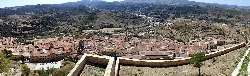 Panoramic view of Morella from the castle, with streets and old buildings.