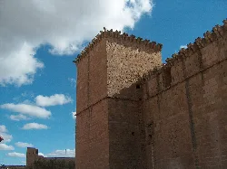 Stone castle tower and walls in Mora de Rubielos.