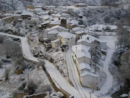 Houses and roads covered in snow in Cerveruela.