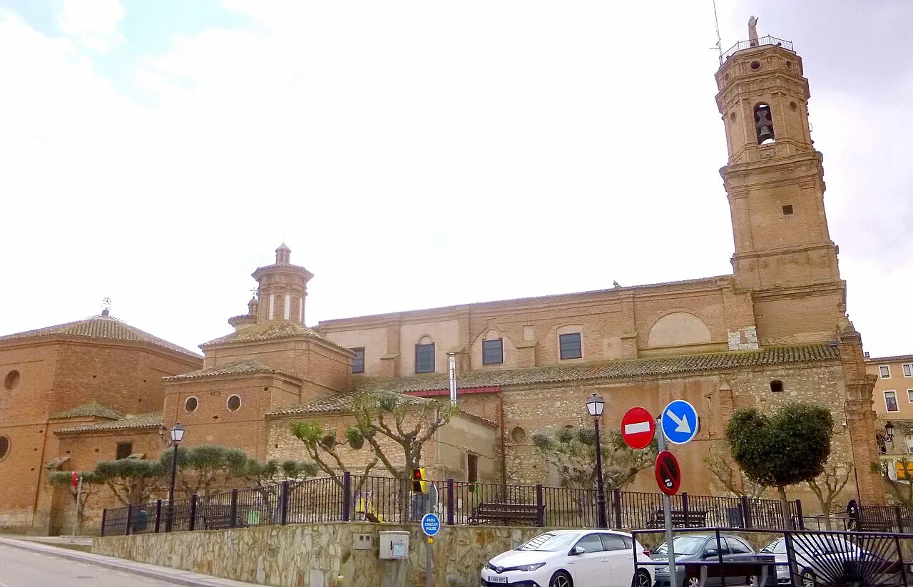 Church of Our Lady of the Angels in Mallén, Zaragoza, with tower and brick walls.