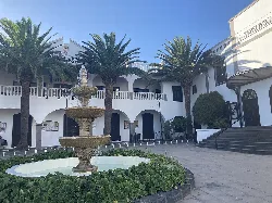 Square with fountain and palm trees in San Bartolomé, Lanzarote.