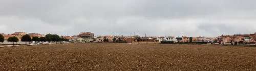 Open field with houses and buildings in Horche, Guadalajara, Spain.