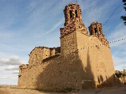 San Javier Church with brick towers in Escatrón.