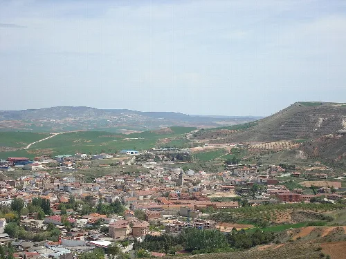 View of Jadraque Castle and the town with hills in the background.