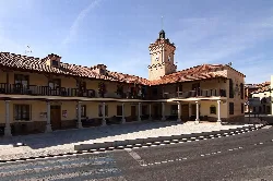 Town hall building with tower and balcony in Camarena, Toledo.
