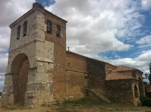 Old church with tower and arch in Calahorra de Boedo.