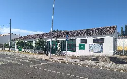 School building with mural and fence in Mata de Alcántara, Cáceres.