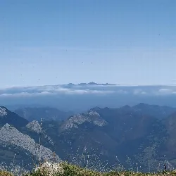 Mountain landscape with peaks and blue sky from Ponga, Asturias.