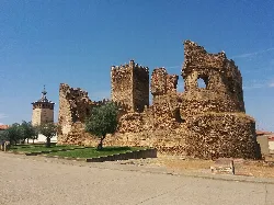Ruins of a castle with towers and walls in Laguna de Negrillos.