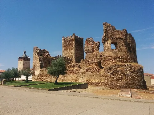 Ruins of a castle with towers and walls in Laguna de Negrillos.