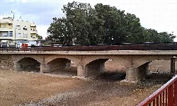 Stone bridge with three arches in Fuente Álamo de Murcia.