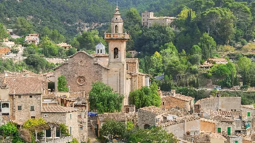 Valldemossa village with church and houses in Mallorca