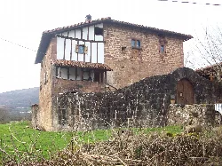 Stone castle with wood and brick structure in Ursua, Navarra.