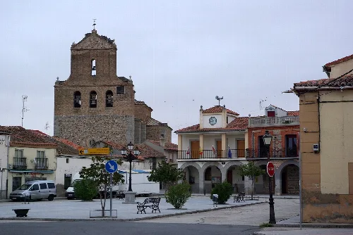 Victory Square, church of Saint Isidore the Laborer and Town Hall of Velayos. Ávila, Spain.