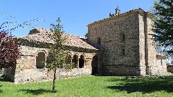 San Bartolomé Church with stone structure and arches.