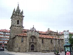 San Sebastián Church in Reinosa with tower and stone facade.