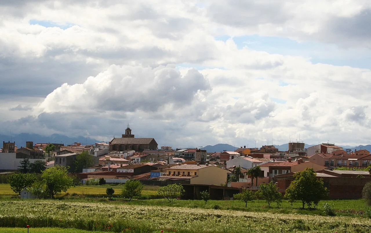 Urban landscape of Vidreres with houses and a central building.