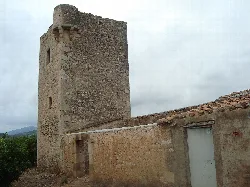 Medieval refuge and defense tower in Cabanes with a rounded tower.