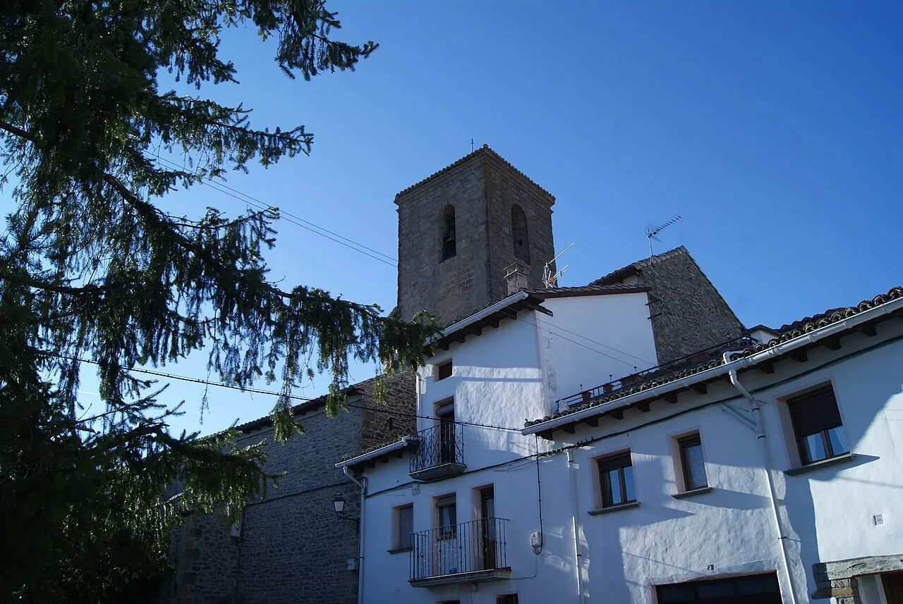 Church tower and white houses in Artieda, Zaragoza.