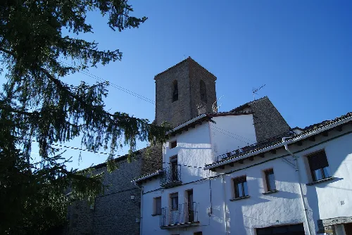Church tower and white houses in Artieda, Zaragoza.