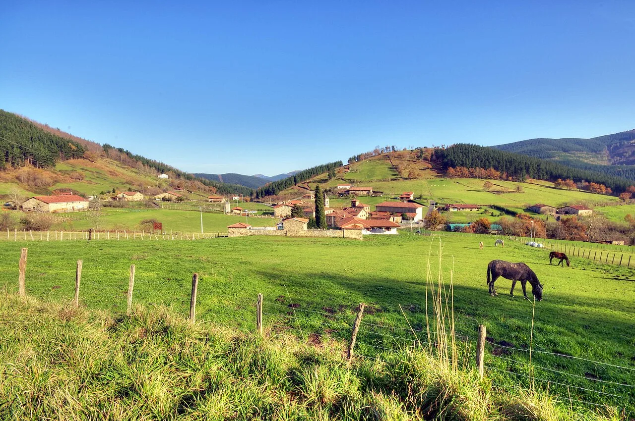 Green meadows with horses and hills in the background in Axpe, Atxondo.