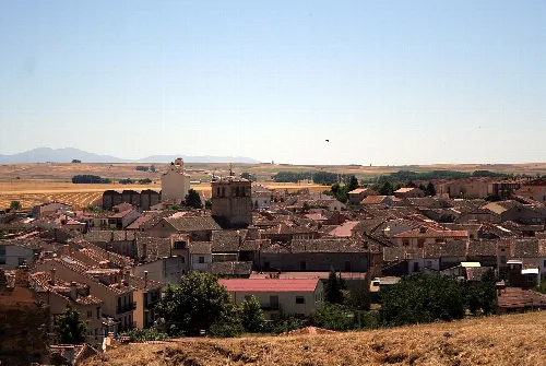 View of rooftops and a castle in Turégano, Segovia.