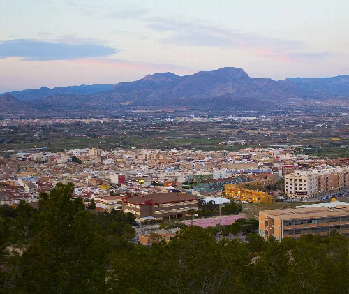 Panoramic view of Aspe with mountains on the horizon and neighborhood in the foreground