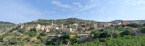 Vilanova de Prades under the Serra de la Llena