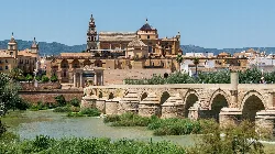 View of Córdoba's historic center with the Mosque-Cathedral and Roman Bridge.