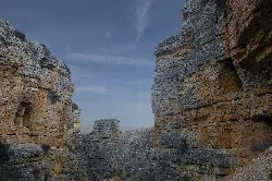 View of the Roman aqueduct in Gea de Albarracín with rock formations.