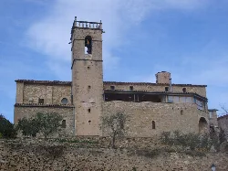 Sant Miquel Church in Castellgalí, with tower and stone structure.