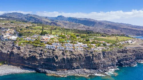 View from the North Atlantic to the steep coast and landscape of Laguna de Santiago on La Gomera, Spain