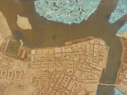 Maqueta del puerto de Isla Cristina con edificios y muelles.