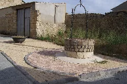 Stone well in a historic site in Villalba de los Alcores.