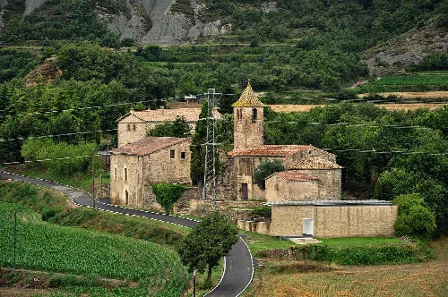 Parish Church of St. Stephen in the hamlet of Múnter (Muntanyola municipality, county Osona, Catalonia, Spain). The church forms a small group with a house and the rectory. The rectory is a large Catalan farmhouse. The church is of Romanesque origin, but was transformed in the 17th century.