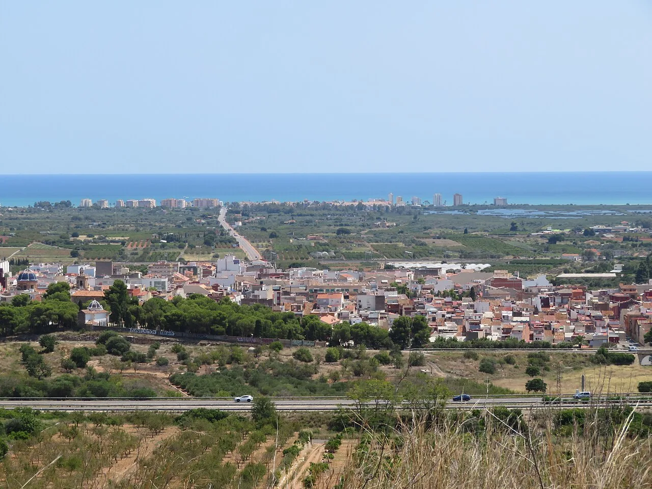 View of Torreblanca with sea and town in foreground.