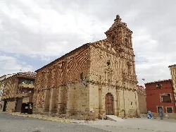 Old stone church with bell tower in Sartaguda, Navarra.