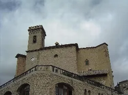 Church of the Assumption with tower and stone facade in Moratalla.