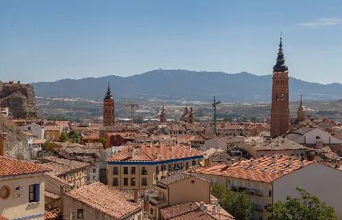 Panoramic view of Calatayud with towers and mountains in the background